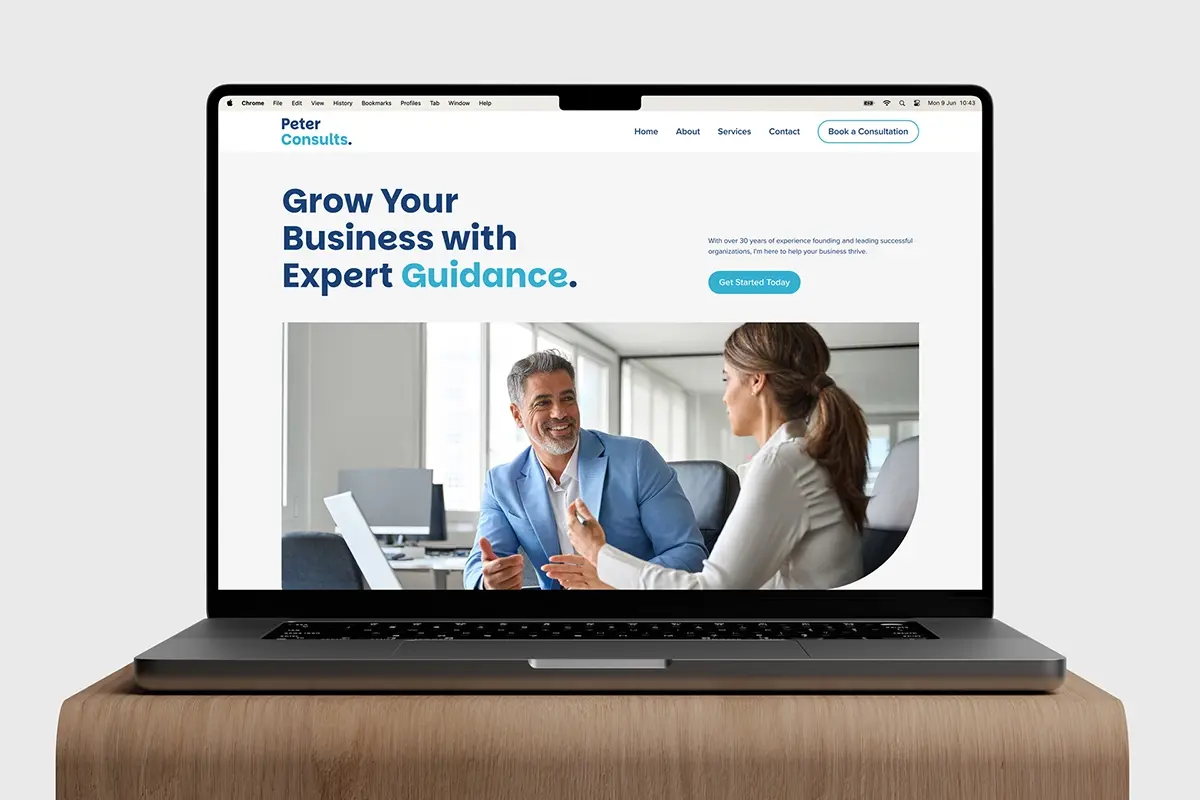 A mock up of PeterConsuts new website on a laptop