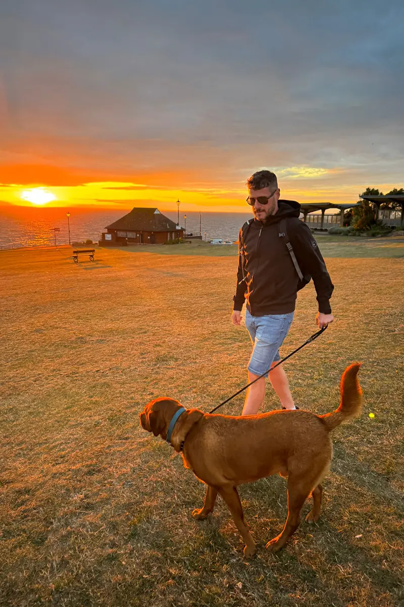 Wayne walking Fred as the sunsets
