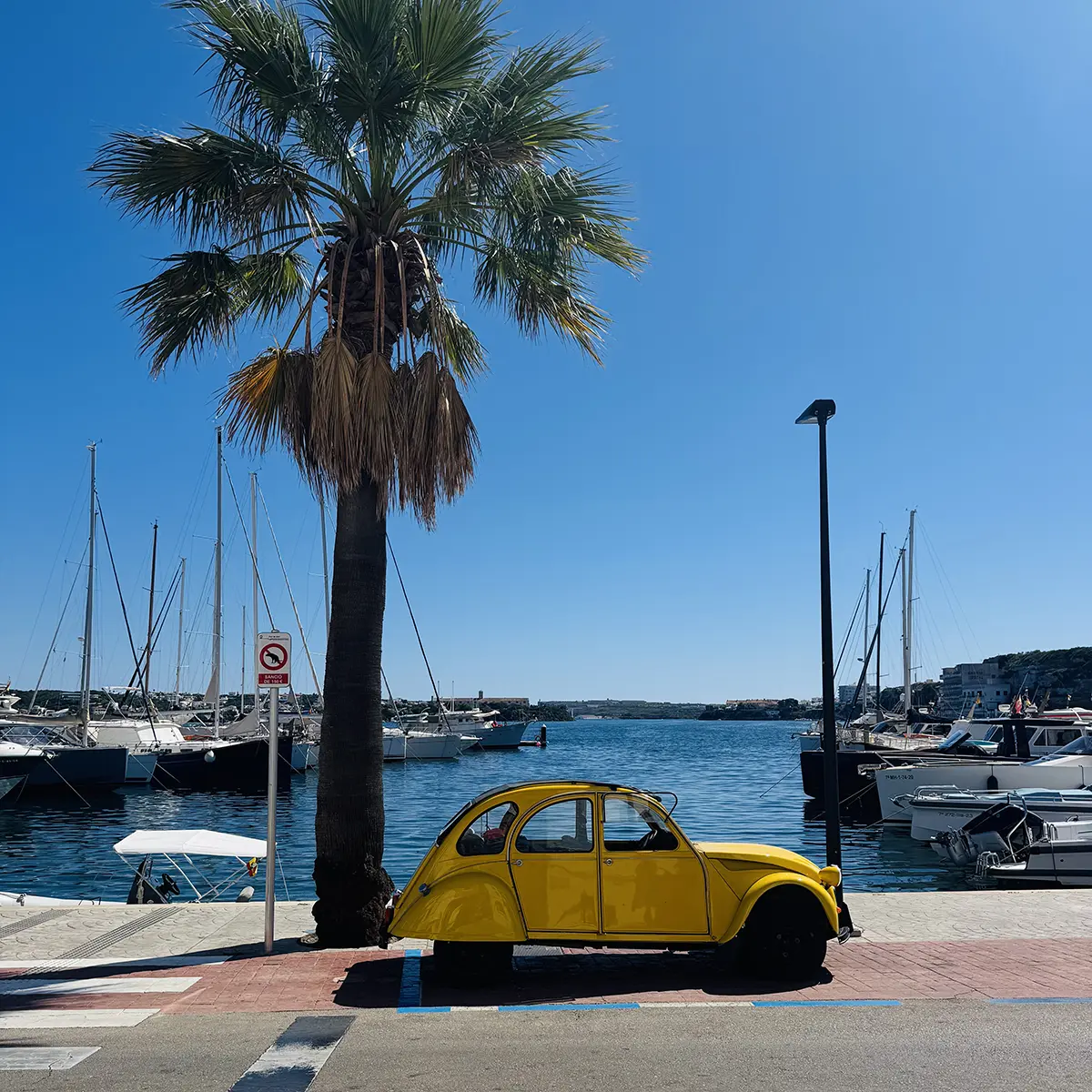 Classic yellow car in Mahon