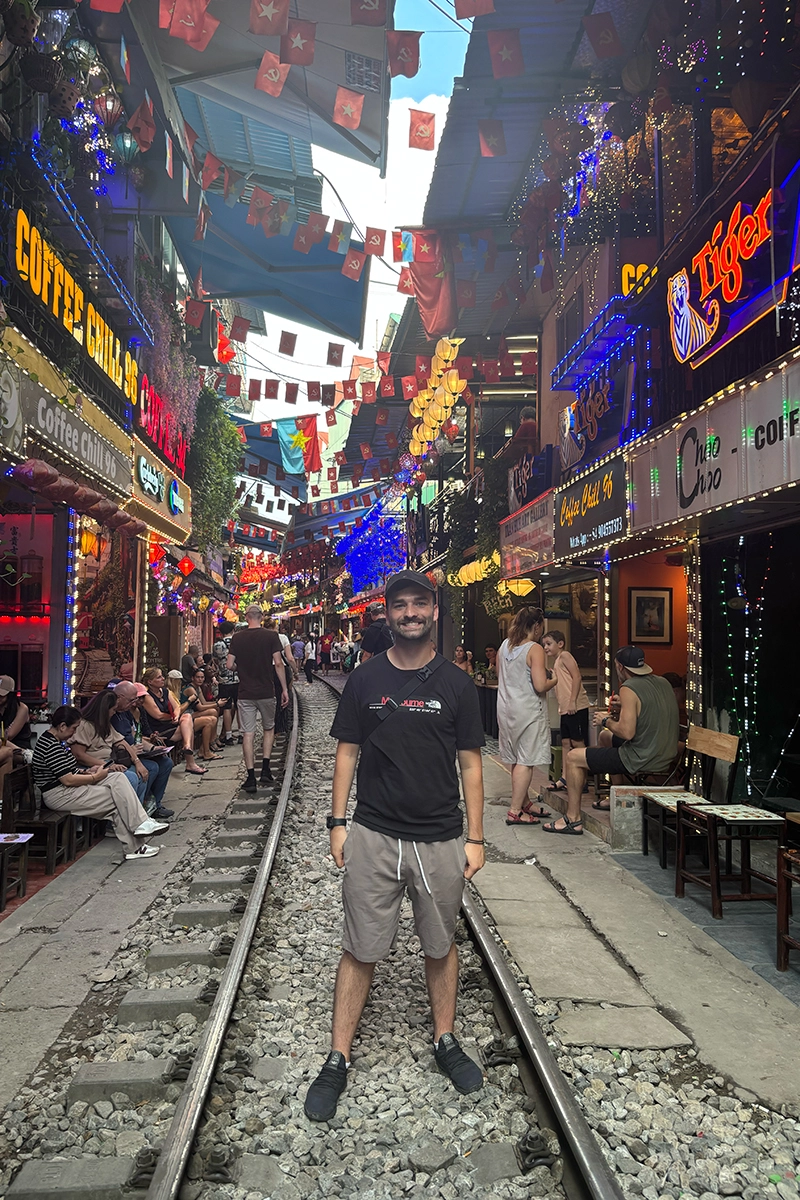 Matt on train street in Hanoi