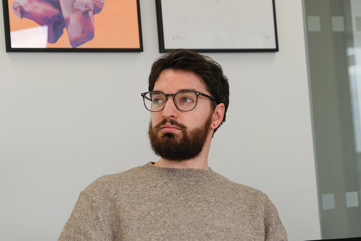 Reece listening to a presentation