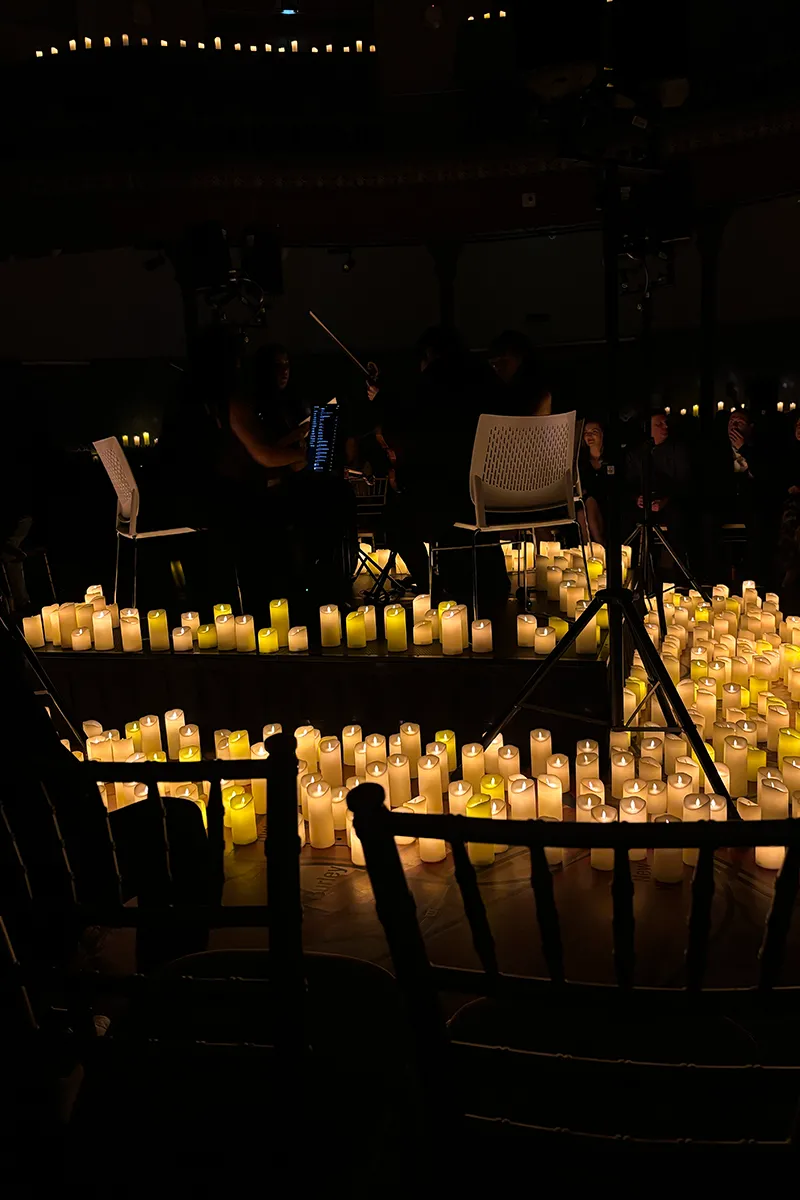 A string quartet about to perform by candle light at Leeds City Museum 