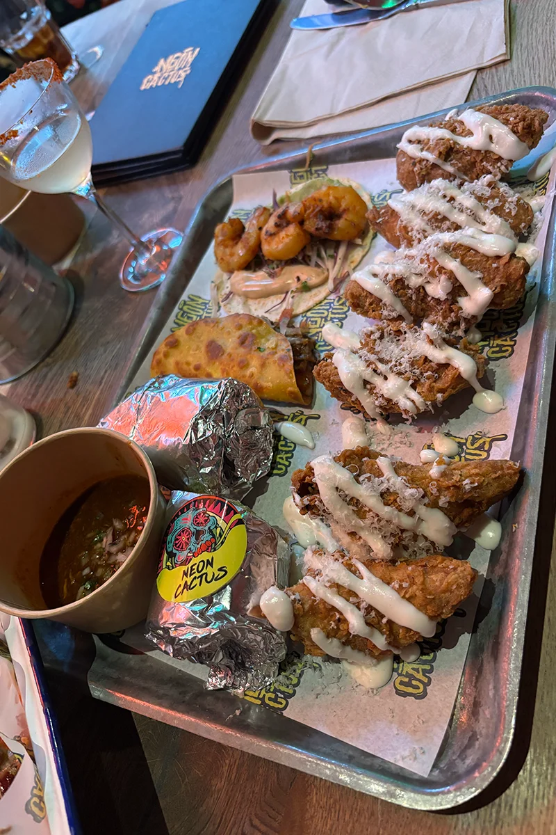 Burritos, tacos and chicken wings at Neon Cactus