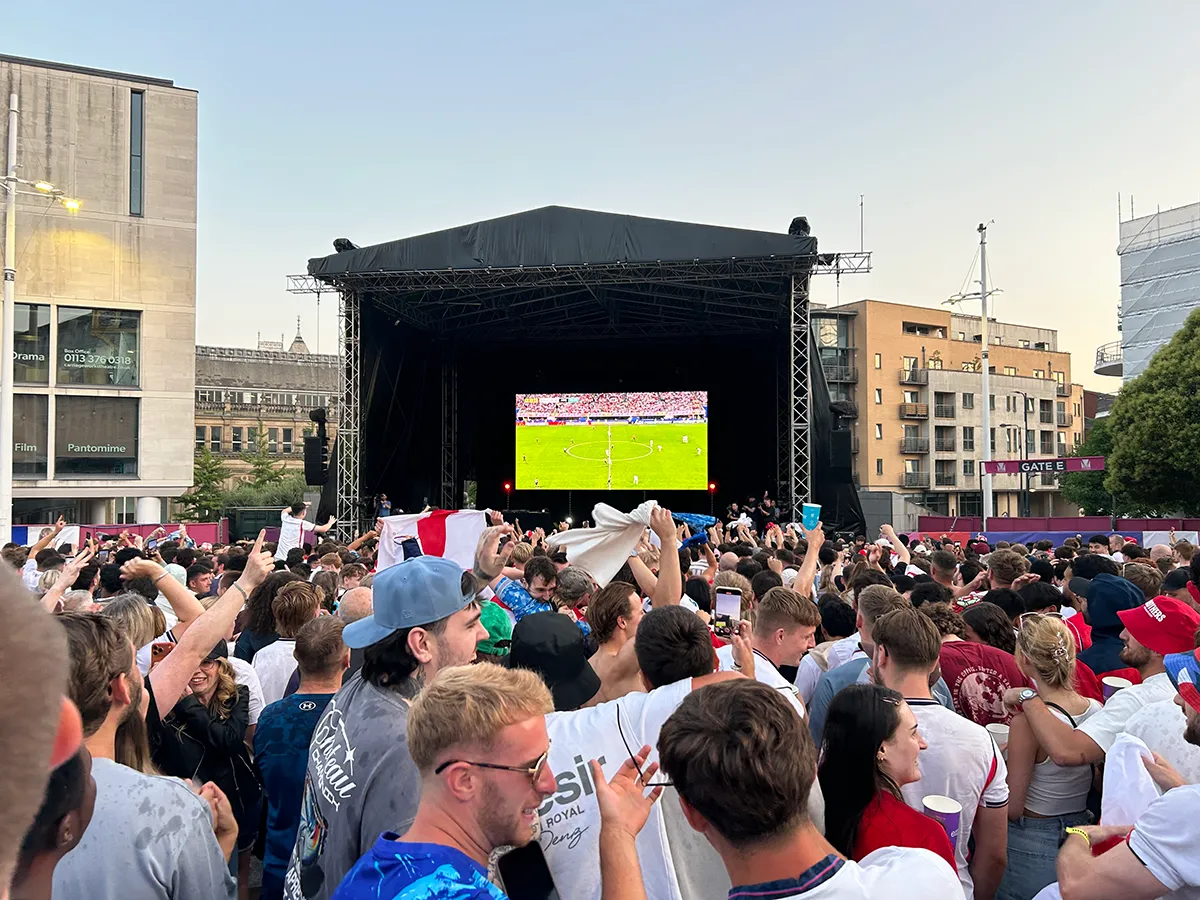 People watching the World Cup on the big scree