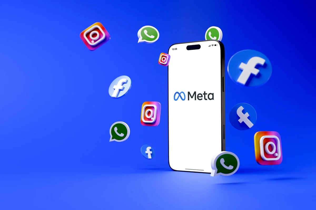 a phone with the meta logo and icons of meta products floating around the phone