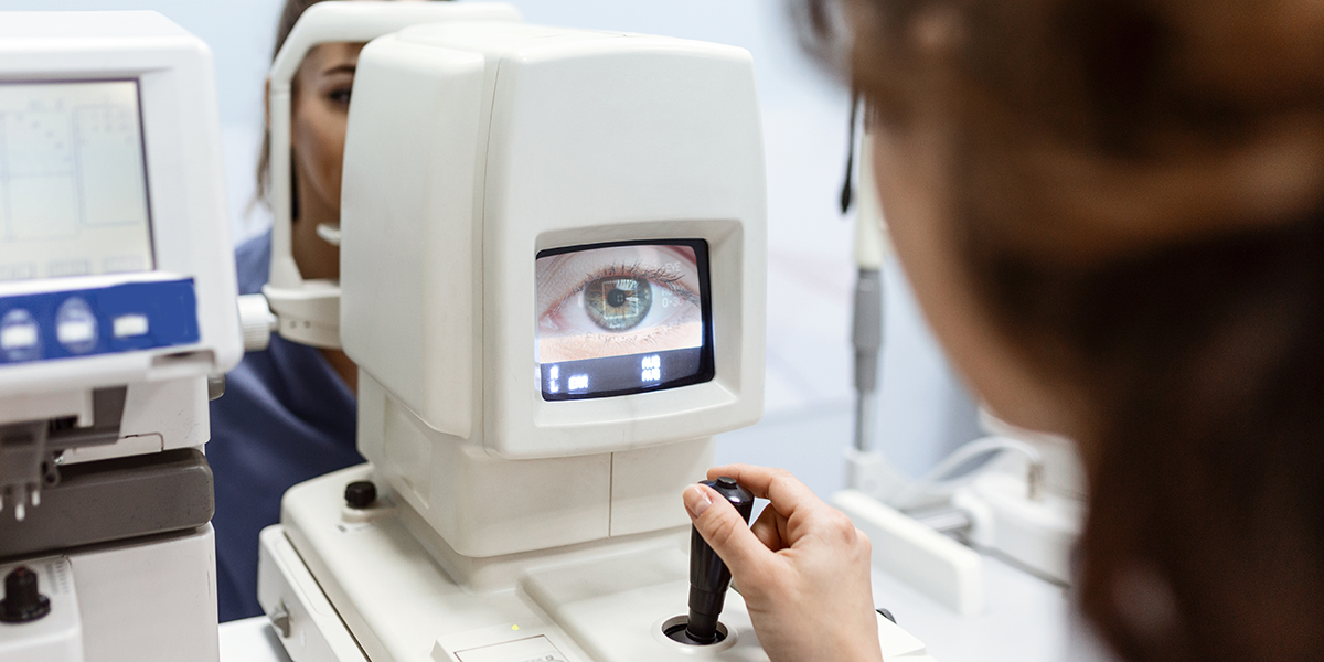 A doctor performing laser eye surgery. 