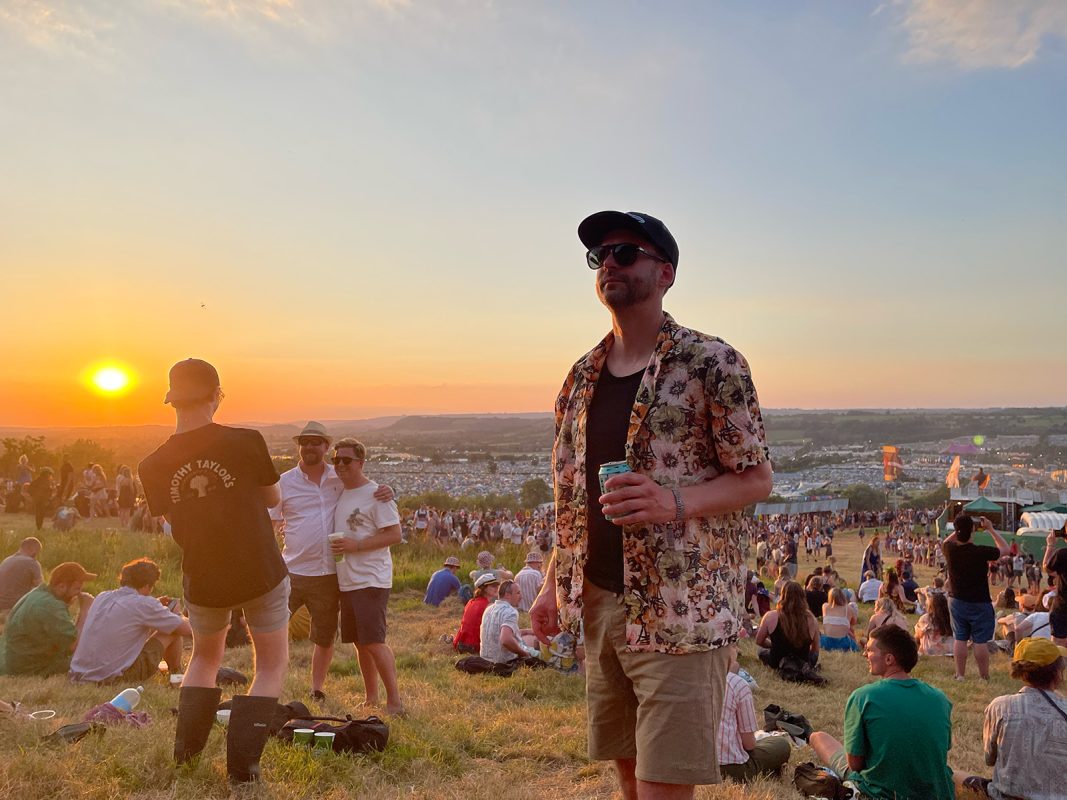 web development expert, Matt, enjoying glastonbury at sun set 