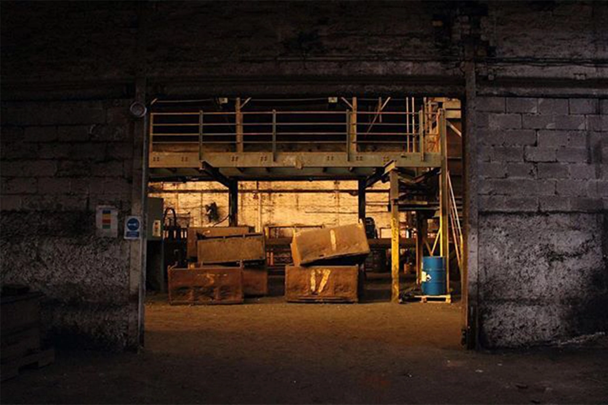 a image of a abandoned factory showing storage boxes