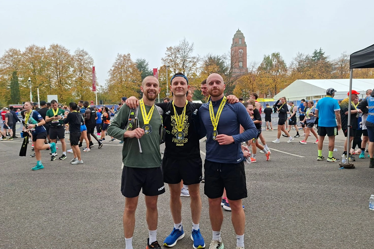 Me, Sam and my brother Adam holding our medals at the end of the race